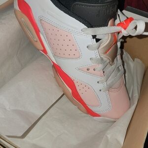 Air Jordan 1 Mid Pink and White Sneakers